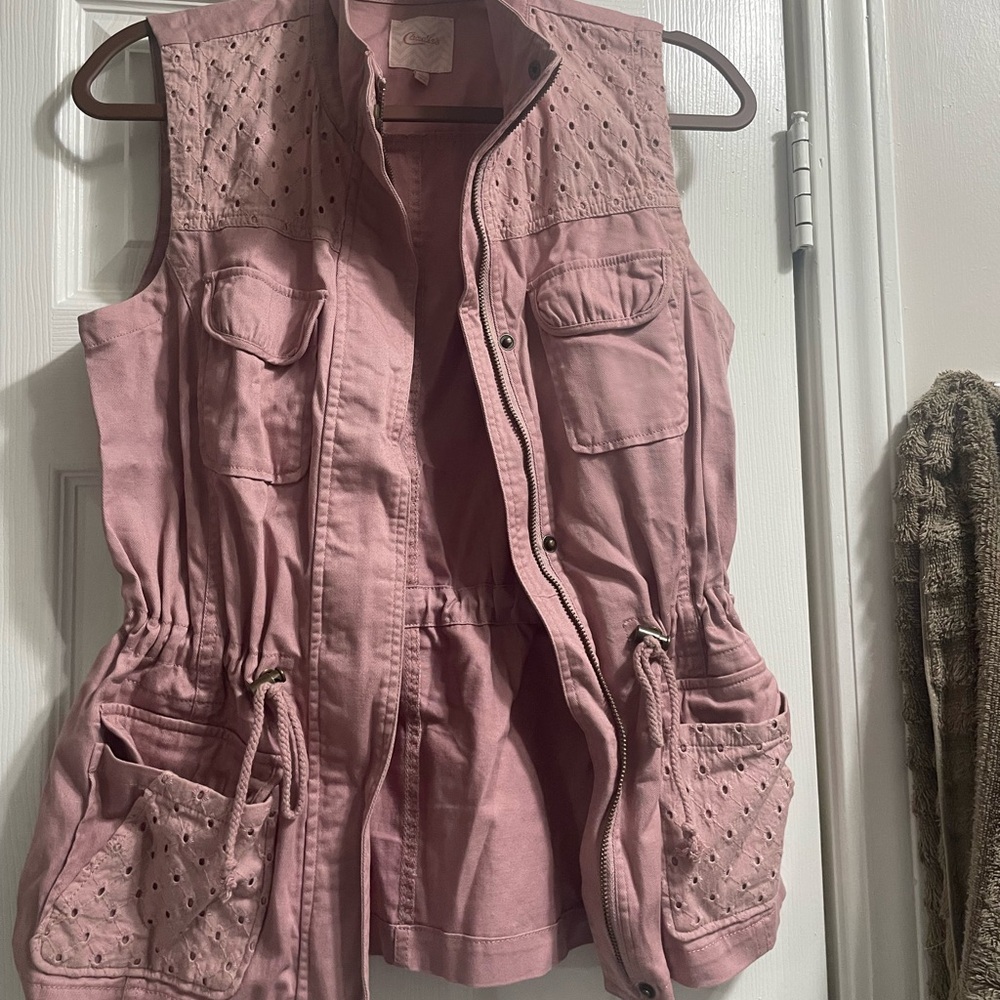 Candie’s pink vest
